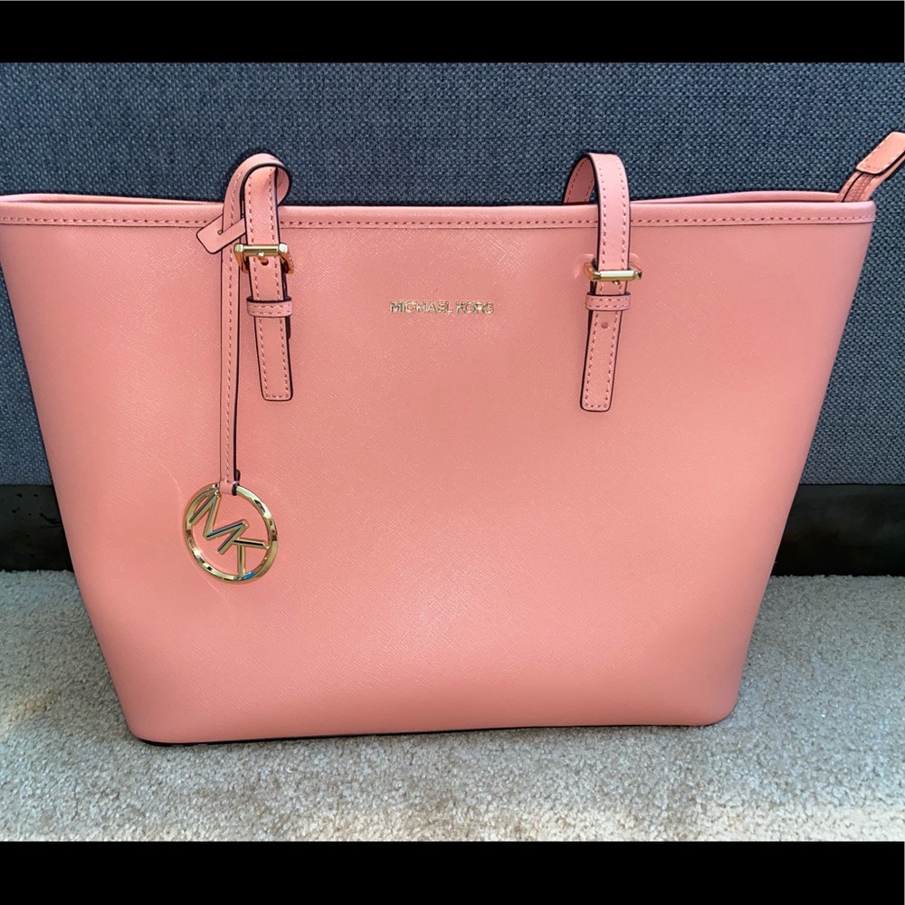Michael Kors salmon/pink purse! Brand new condition.